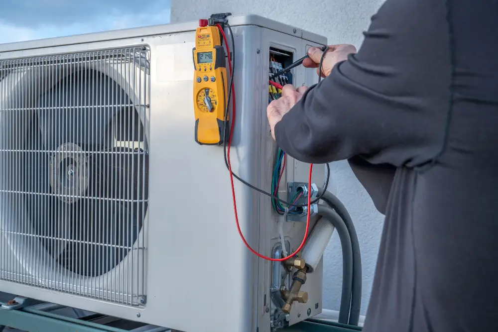 Vanport technician repairing a mini split system