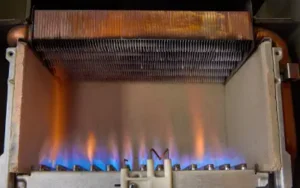 pilot light inside a gas furnace in portland basement